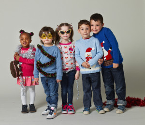 Kids can help make the world better by wearing a holiday sweater on Dec. 12. Photo by Dan Burn-Fort / Save the Children.